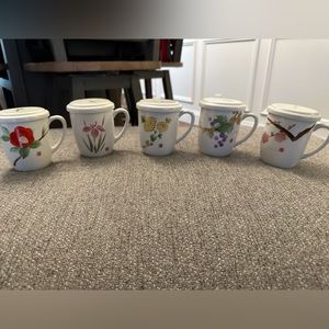 3 1/2" Oriental Mugs. Each Signed. Each has a matching cover to keep warm.